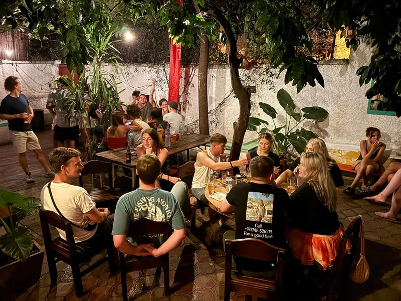 The exterior of Trip'n'Hostel Original at sunset — a 1920s villa in Tirana