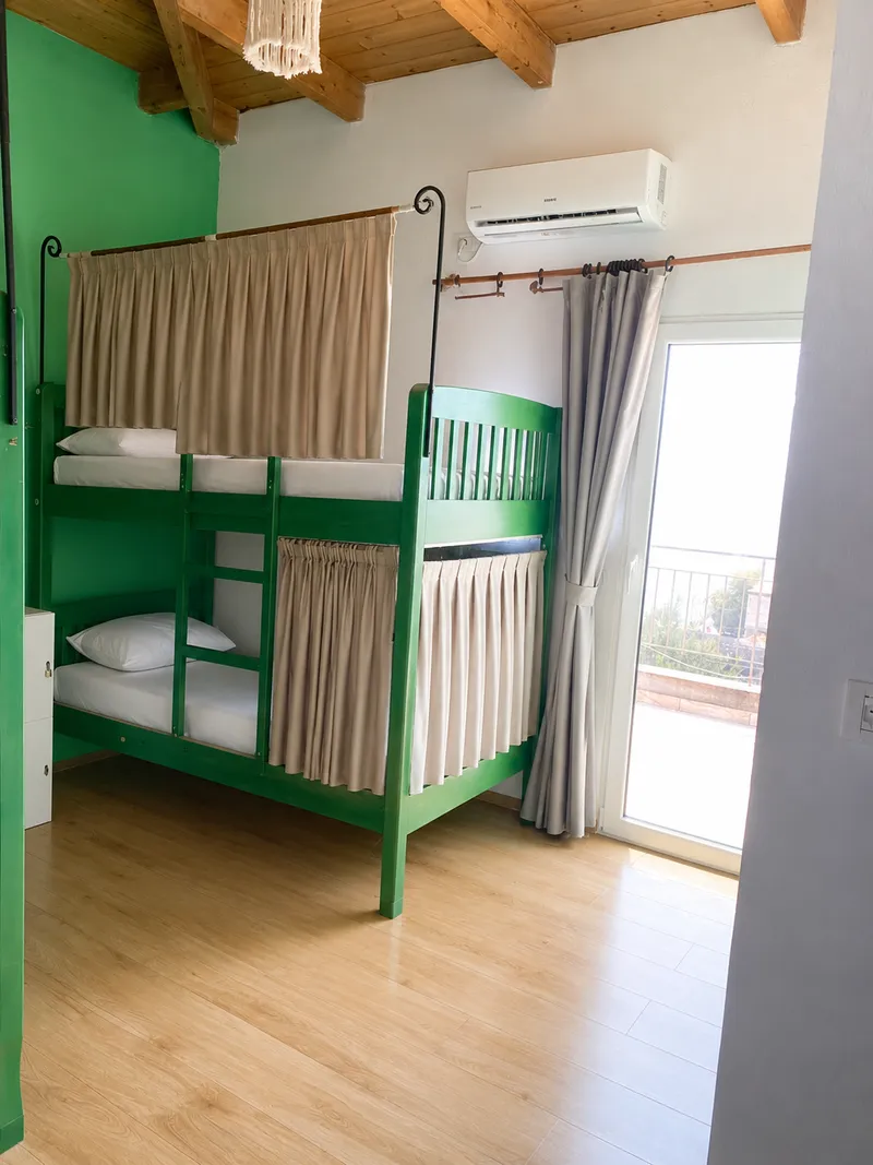 Eight-bed dormitory at Trip'N'Hostel Seaside with balcony